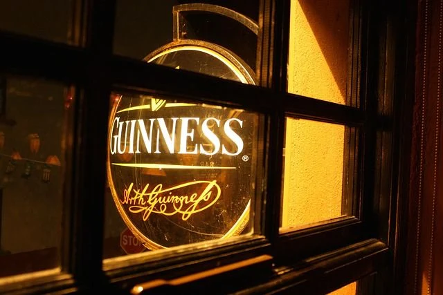 Guinness Nigeria stout bottles and cans following the latest price increase.